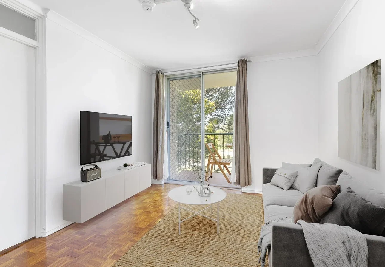 Bright and comfortable living room with balcony access for NDIS disability accommodation
